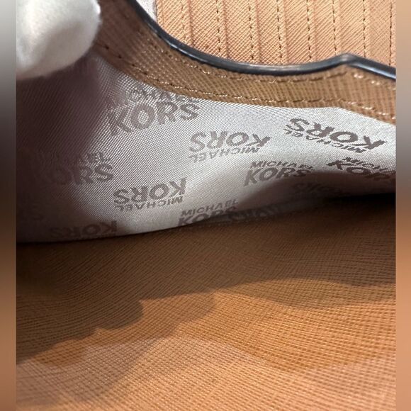 Michael Kors Pebbled Leather Zippy Long Wallet - Picture 9 of 12